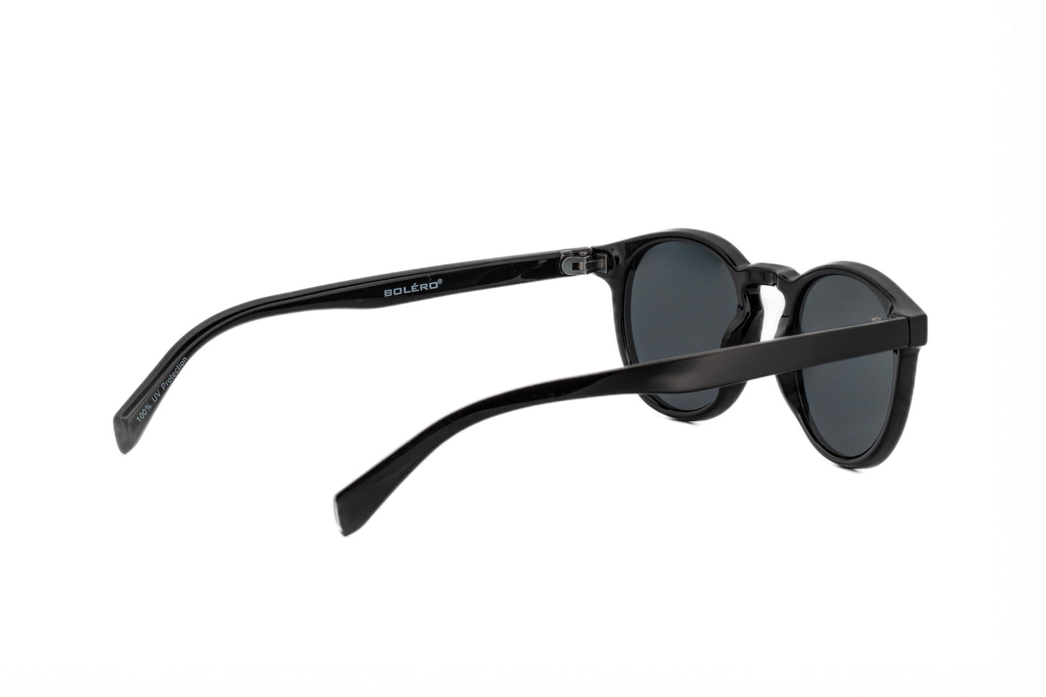 Briar by Bolero Eyewear black crystal round sunglasses with dark UV lenses metal core temples and spring hinges rear three-quarter angle view