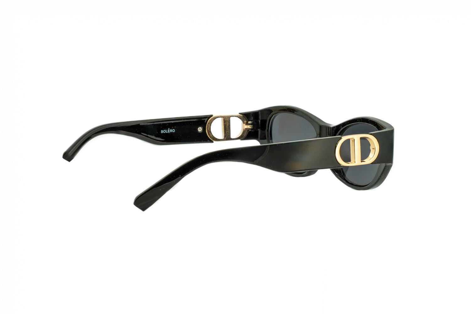 Britney by Boléro Eyewear black oval sunglasses with dark lenses rear-three quarter angle view