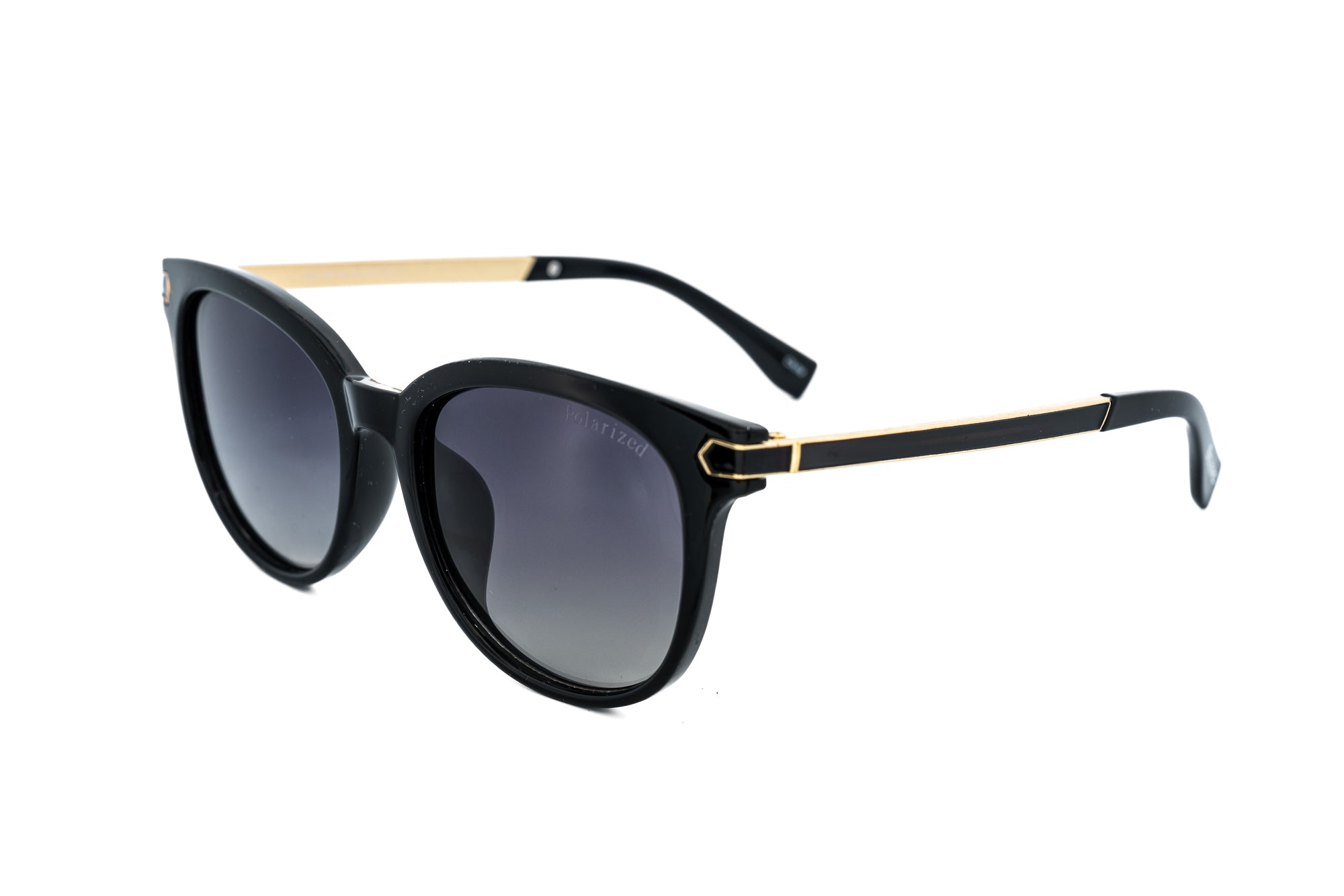Calista by Bolero Eyewear black polarized sunglasses with gold-accented temples and rounded cat-eye shape