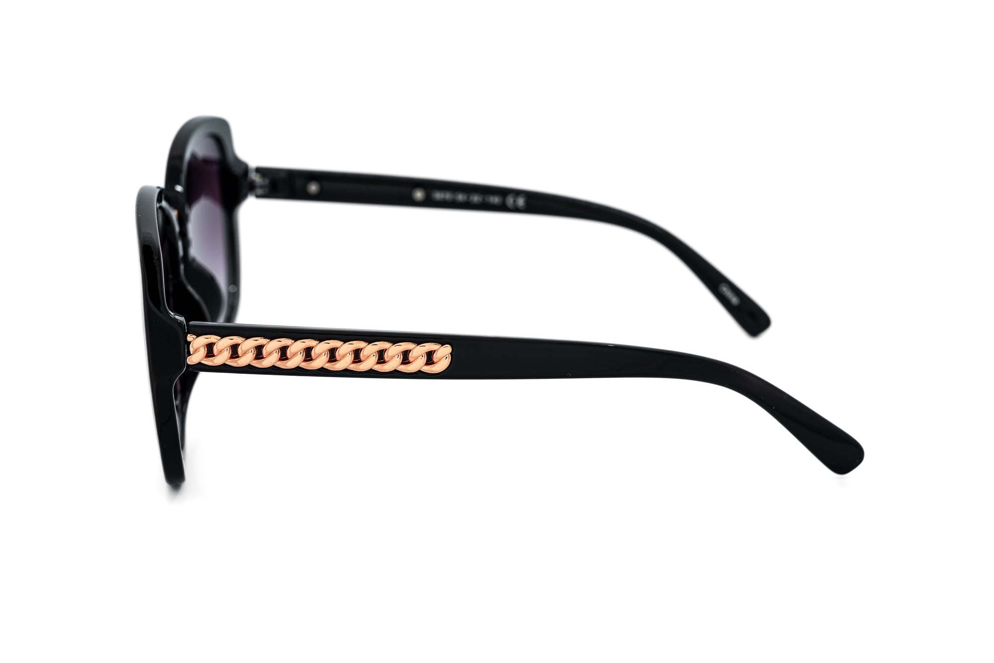 Calyra by Bolero Eyewear oversized black square sunglasses with gold chain temples and smoke gradient lenses side angle view