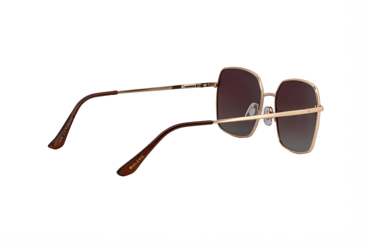 Celesta by Bolero Eyewear gold square sunglasses with polarized brown gradient lenses and lightweight metal frame rear three-quarter angle view
