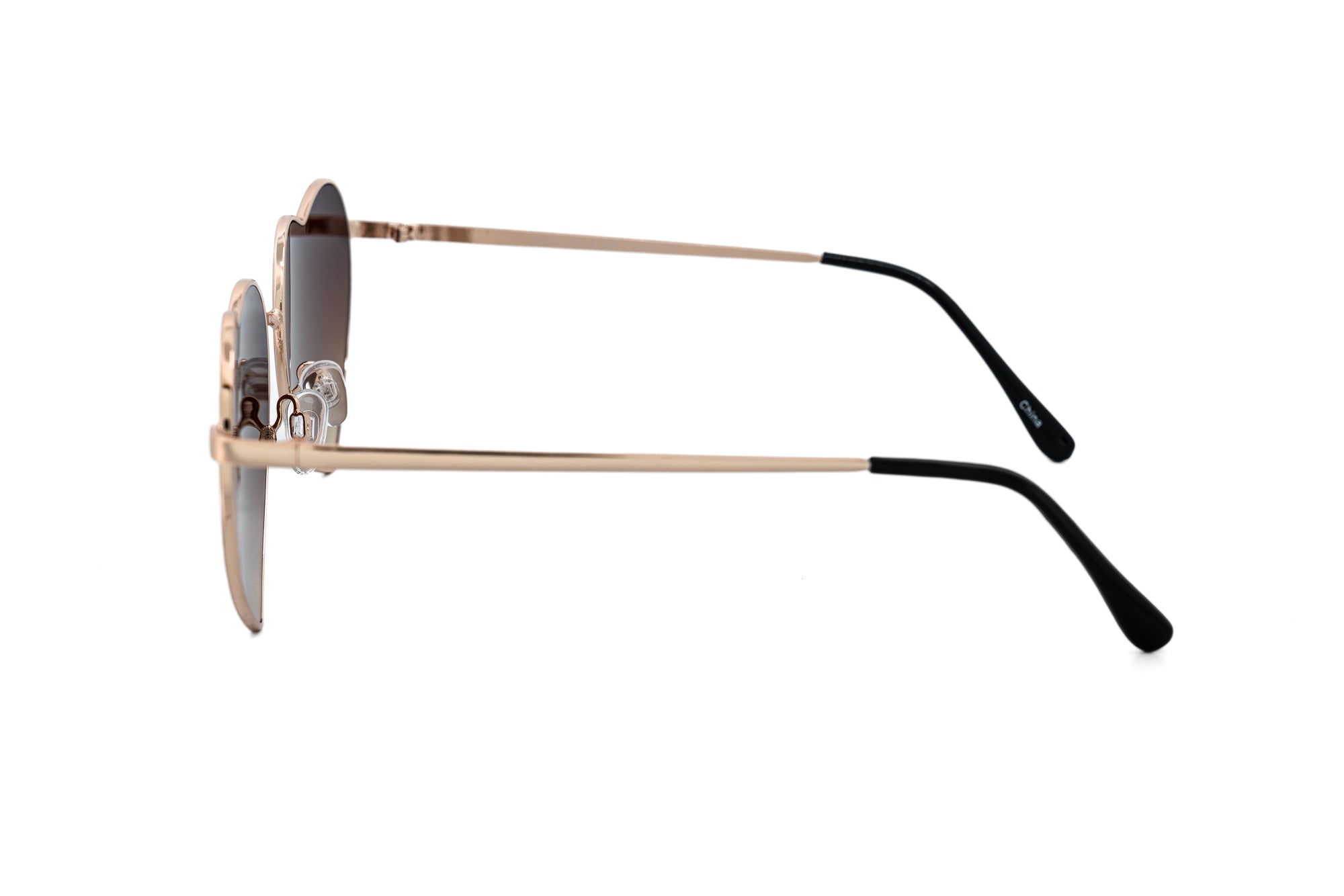 Valentina by Bolero Eyewear heart-shaped sunglasses with gold metal frame and brown gradient lenses side angle view