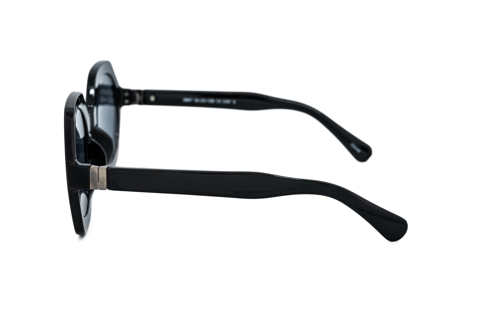 Virelle by Bolero Eyewear geometric black sunglasses with UV-protective lenses and sculpted acetate frame
side angle view