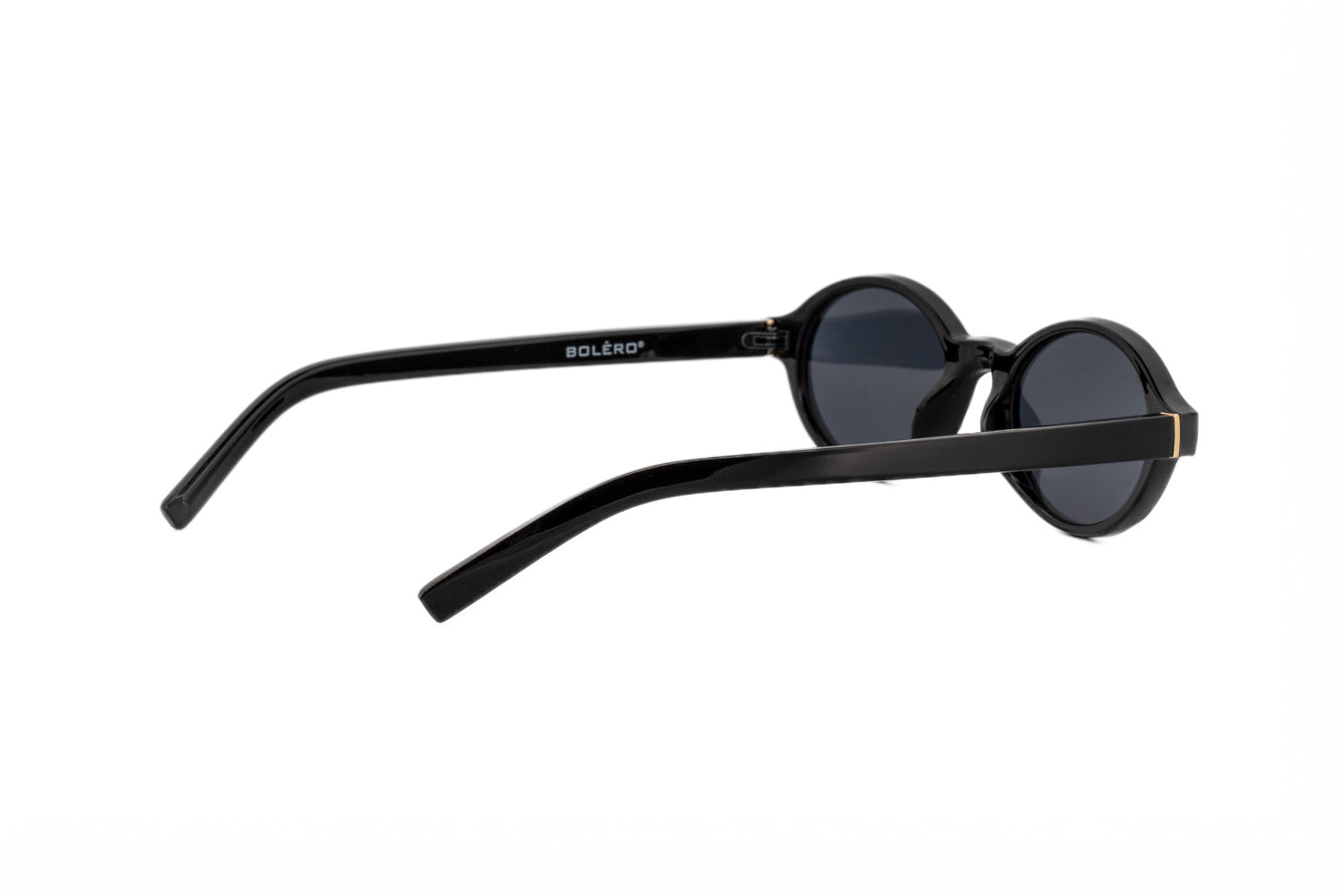 Zane by Bolero Eyewear black oval sunglasses with sculpted acetate frame and smoke lenses
rear three-quarter angle view