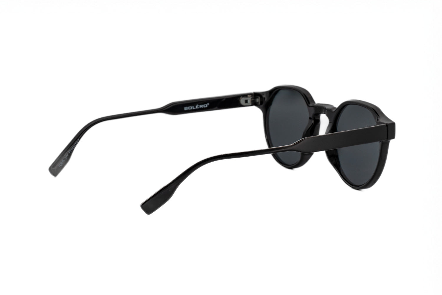 Brody by Bolero Eyewear black crystal round sunglasses with UV lenses metal core temples and spring hinges rear three-quarter angle view