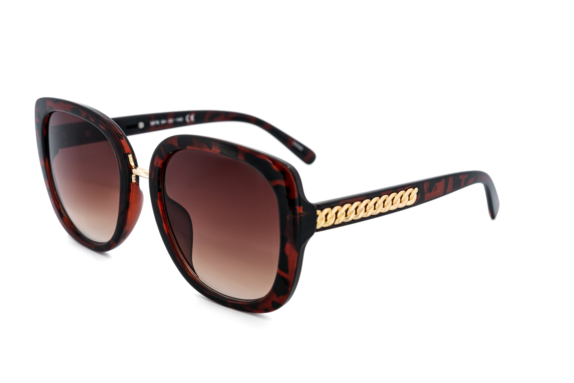 Calyra oversized tortoise sunglasses with gold chain-inspired temple detailing and brown gradient lenses 