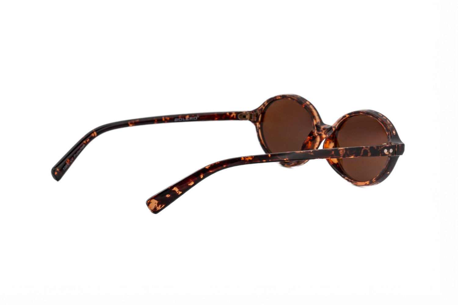 Milo amber tortoise oval sunglasses by Bolero Eyewear with brown UV lenses and crystal pattern frame rear three-quarter angle view