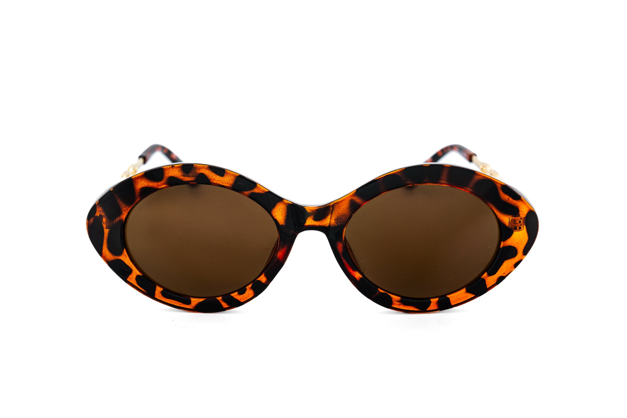 Seraphine by Bolero Eyewear tortoiseshell oval sun readers with gold-link metal temples front angle view