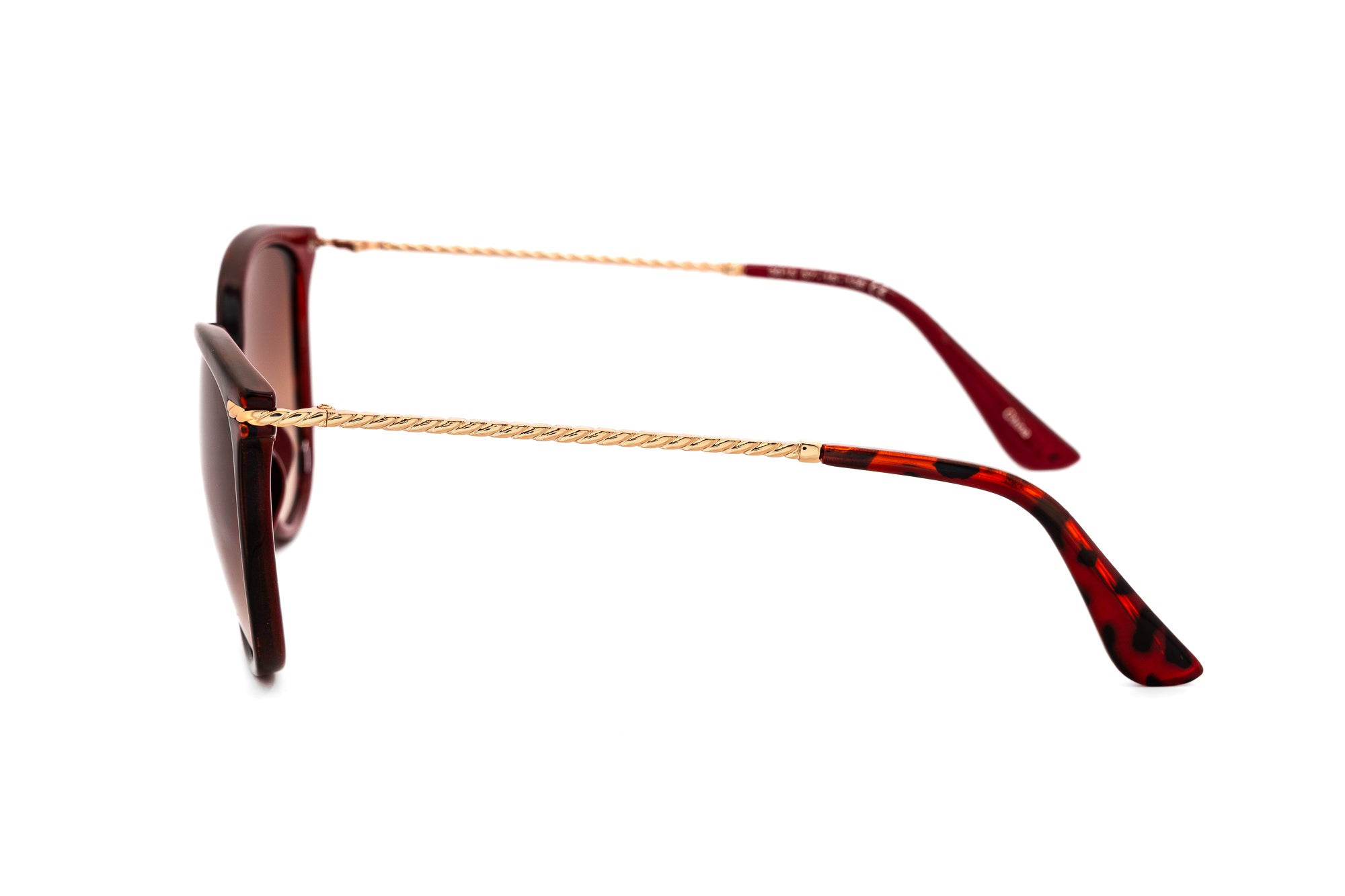 Serelisse by Bolero Eyewear tortoise women’s cat-eye sunglasses with twisted-metal arms and UV brown gradient lenses side angle view