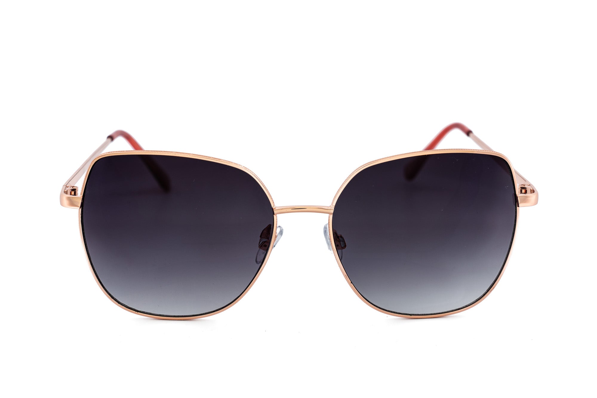 Solea sunglasses by Bolero Eyewear with rose-gold metal frame and smoke gradient oversized lenses front angle view