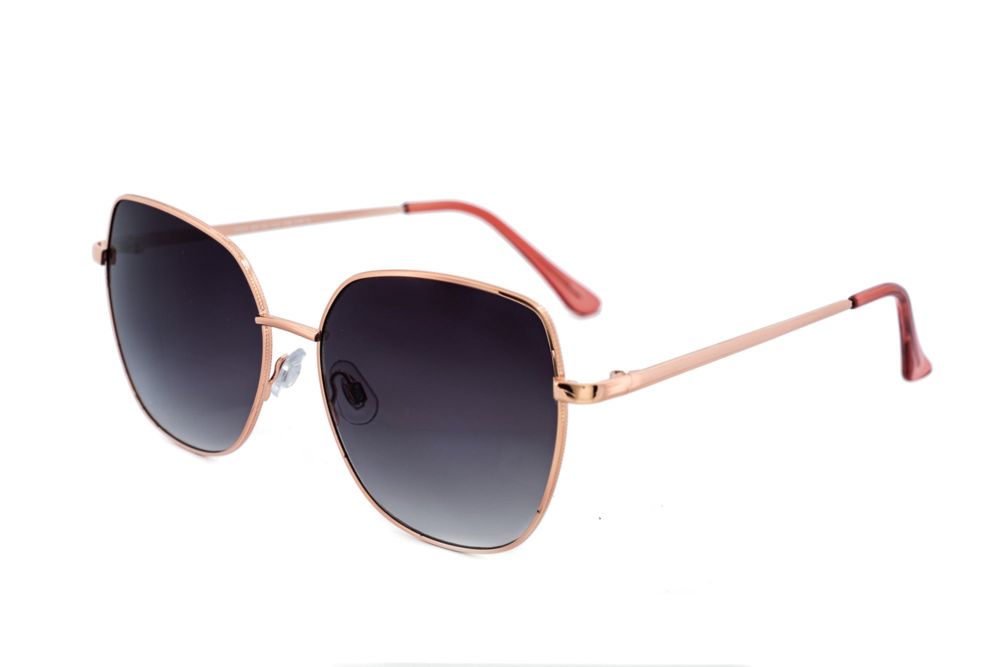 Solea sunglasses by Bolero Eyewear with rose-gold metal frame and smoke gradient oversized lenses