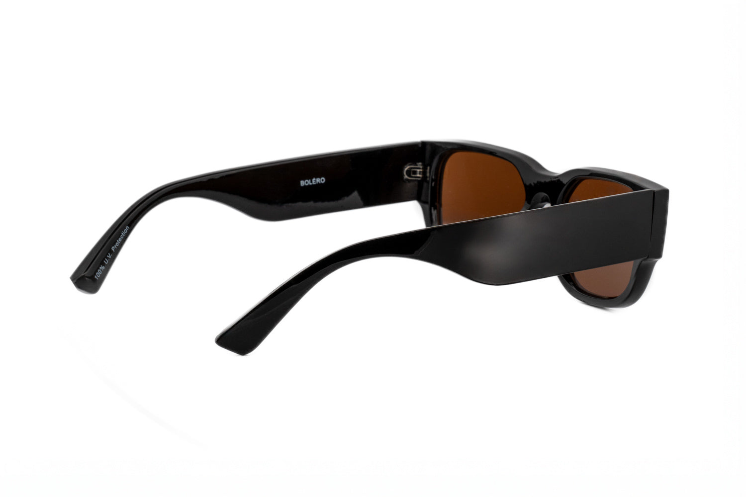 Tatum by Bolero Eyewear rectangular black sunglasses with brown UV lenses rear three-quarter angle view