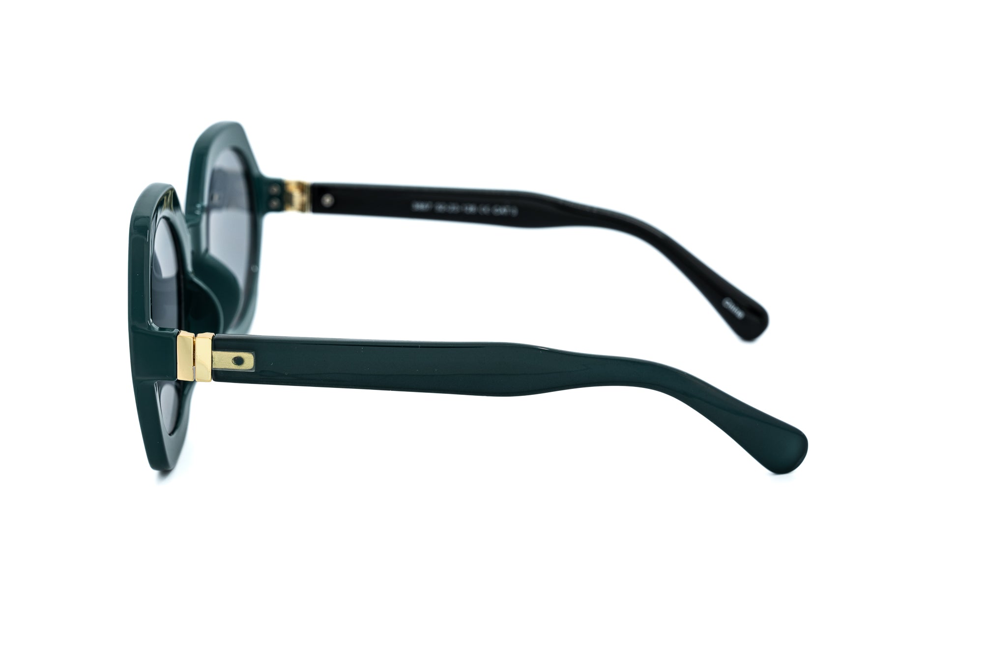 Virelle by Bolero Eyewear bold geometric  green sunglasses with tinted lenses side angle view