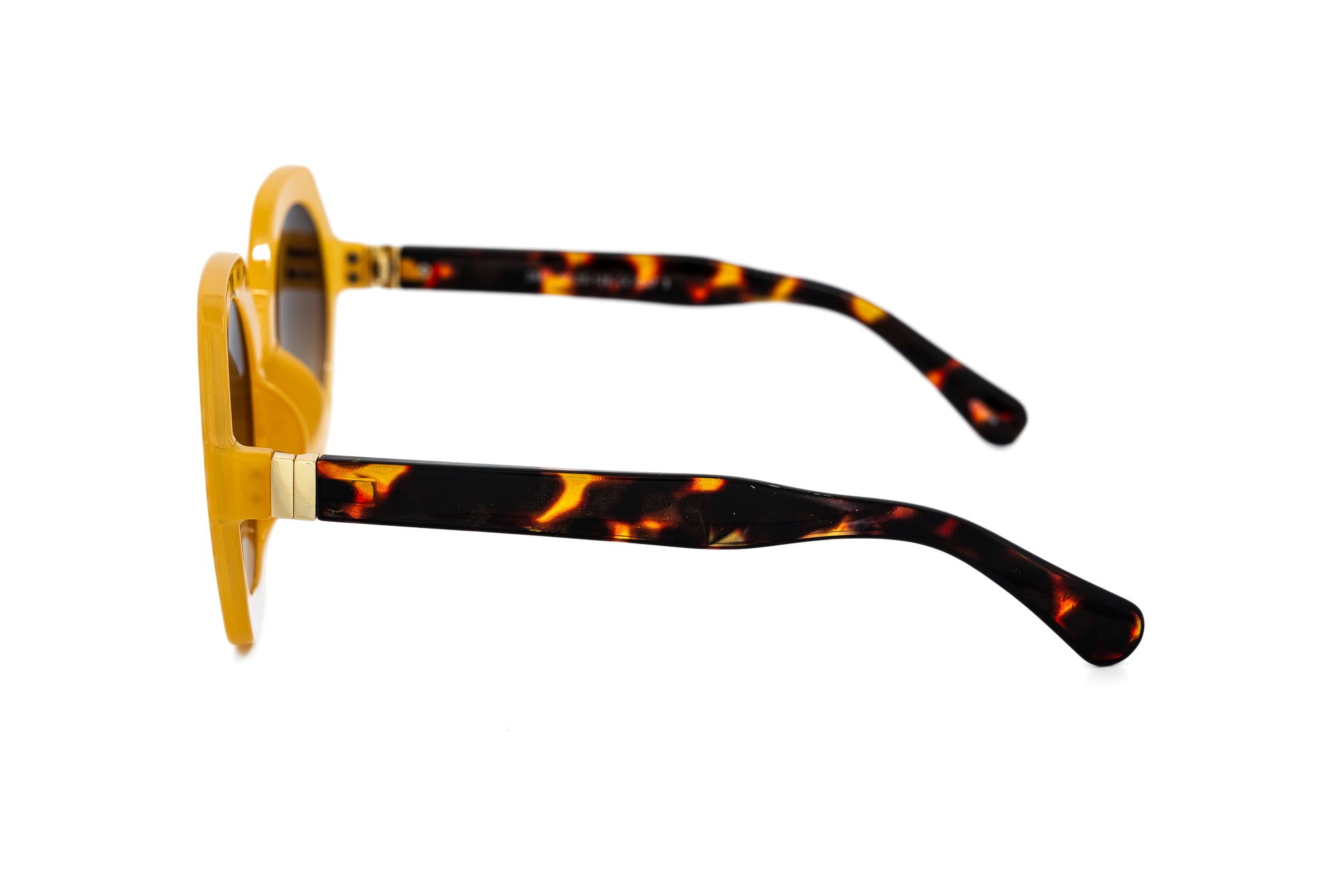 Virelle by Bolero Eyewear oversized geometric yellow frame with gradient lenses
side angle view